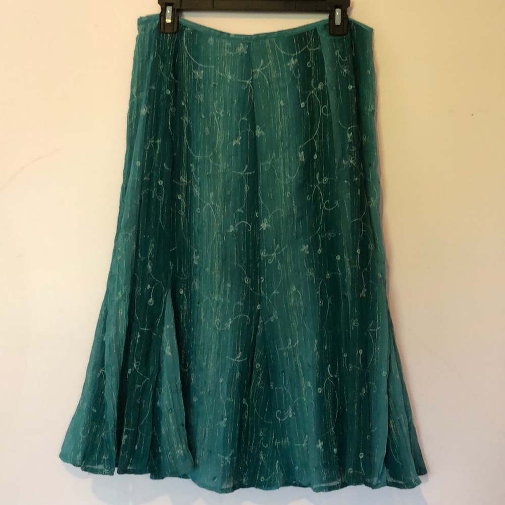Teal skirt with flouncy flair! Size 10 petite.